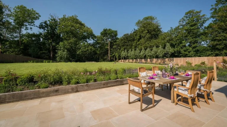 Large open garden with area for hosting meals and entertaining guests